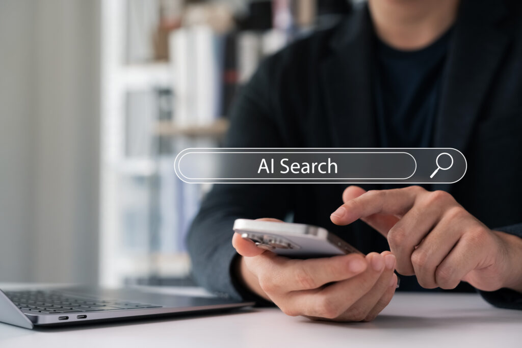 Man using smartphone with AI search bar overlay - Opmasis Digital Marketing